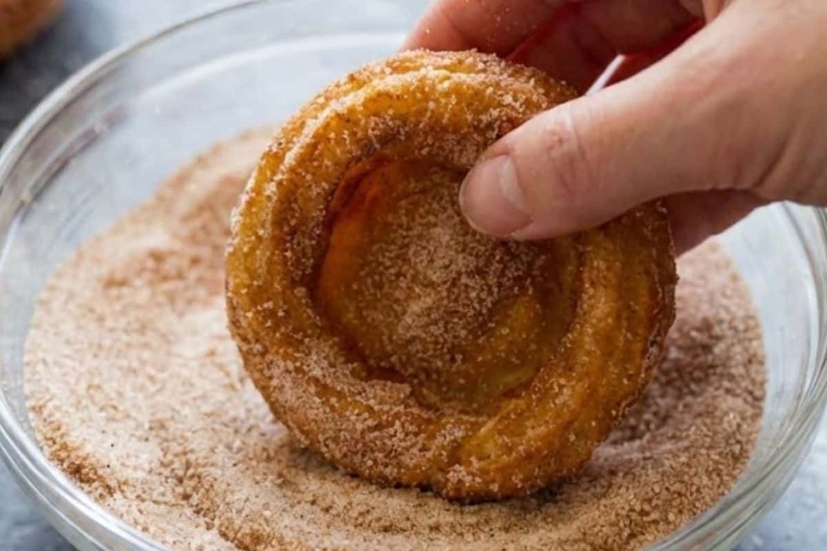 Fill a shallow bowl with cinnamon sugar and coat each churro bowl - 8