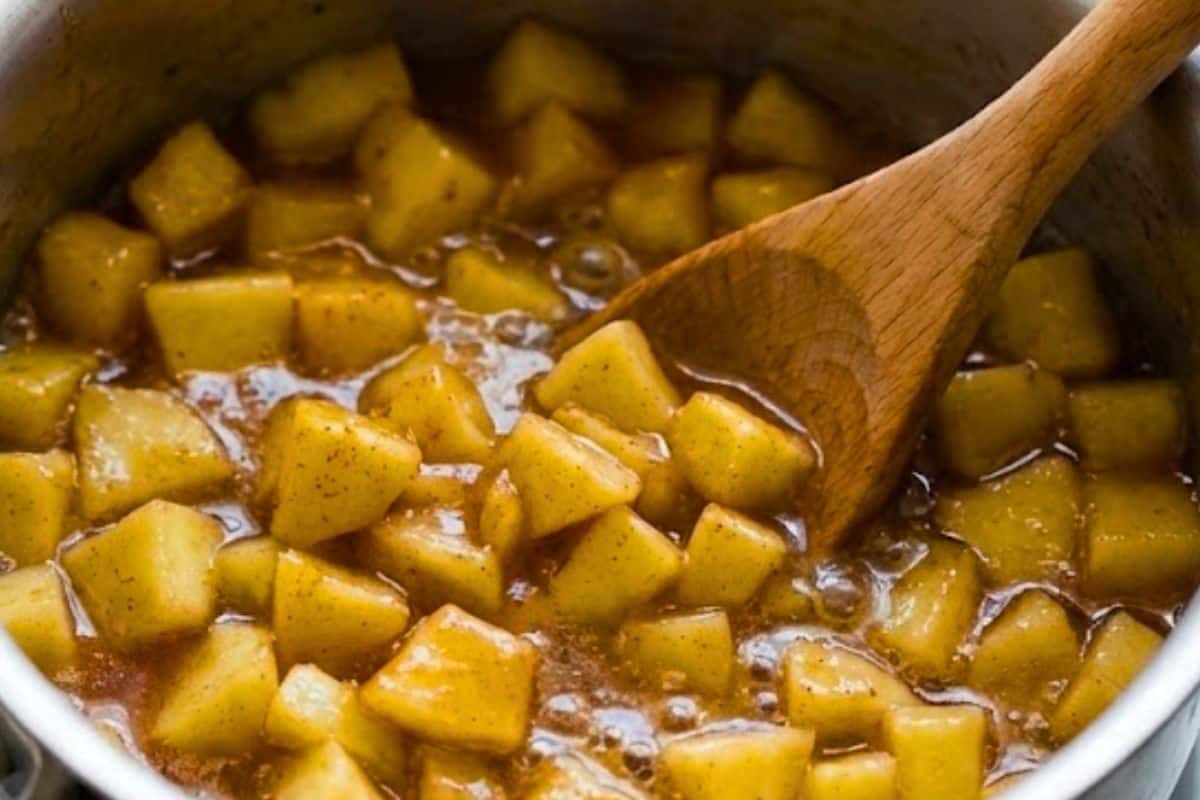 Combine diced apples with lemon juice in a saucepan and set aside. In another pan, whisk cornstarch and water until smooth, then add brown sugar, cinnamon, and nutmeg; bring to a boil, add apples, cover, and simmer 8–10 minutes  - 9