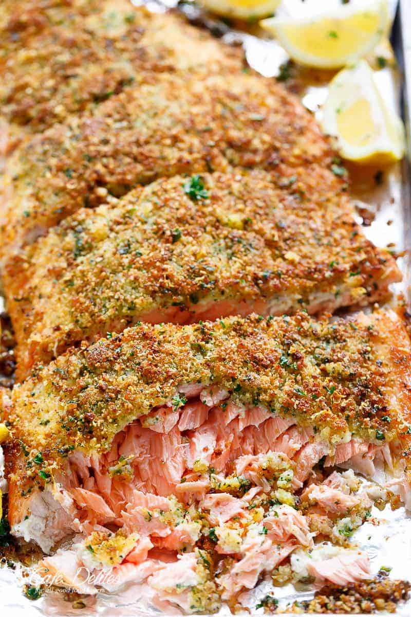 Tender fall apart oven baked salmon with a crispy parmesan crumb topping!