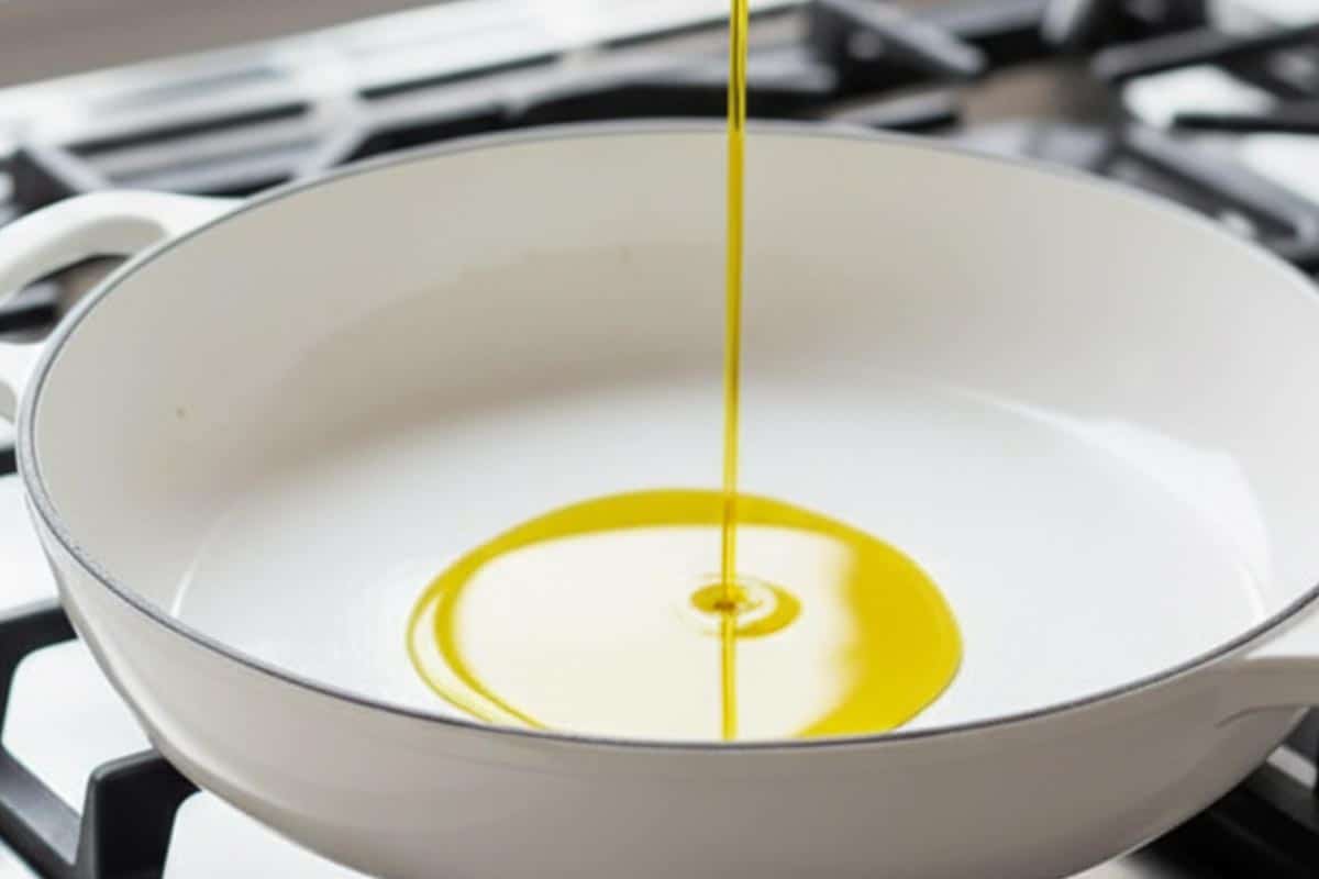 Pouring olive oil in the pan.