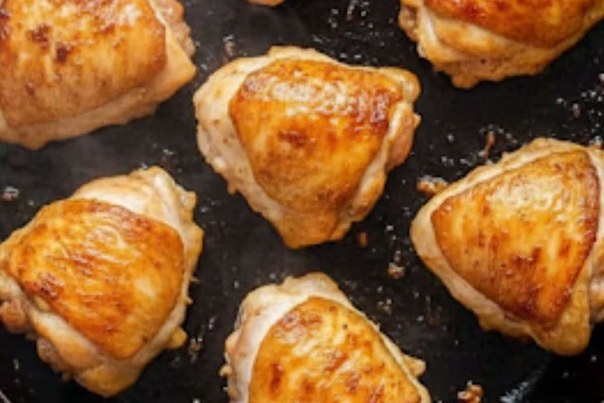 Sear the chicken thighs side down and sear for 3-4 minutes. After searing the chicken transfer the chicken thighs to a plate