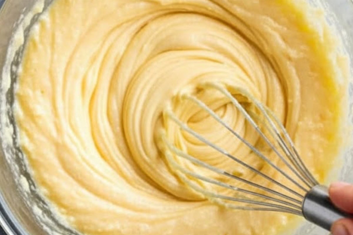 In a large bowl, combine the melted butter, brown sugar, and white sugar.