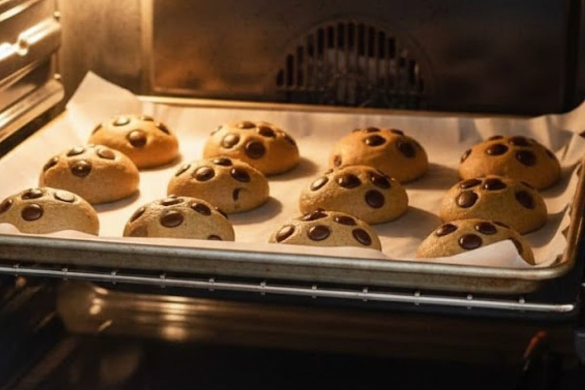 Bake for 10–11 minutes until cookies look pale and puffed but are golden around the edges