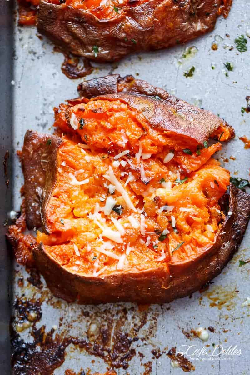 Garlic Butter Smashed Sweet Potatoes With Parmesan Cheese are crispy and buttery on the ou Garlic Butter Smashed Sweet Potatoes With Parmesan