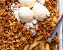 Easy Cinnamon Apple Crumble is foolproof! A juicy apple pie filling is covered with a crispy oatmeal cookie-like topping! BEST apple crumble!