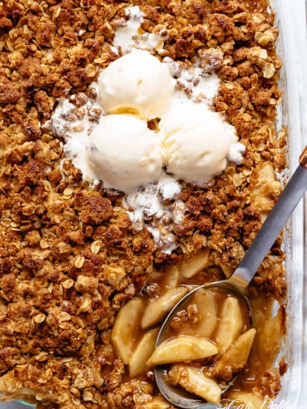Easy Cinnamon Apple Crumble with ice-cream is foolproof! A juicy apple pie filling is covered with a crispy oatmeal cookie-like topping! BEST apple crumble!