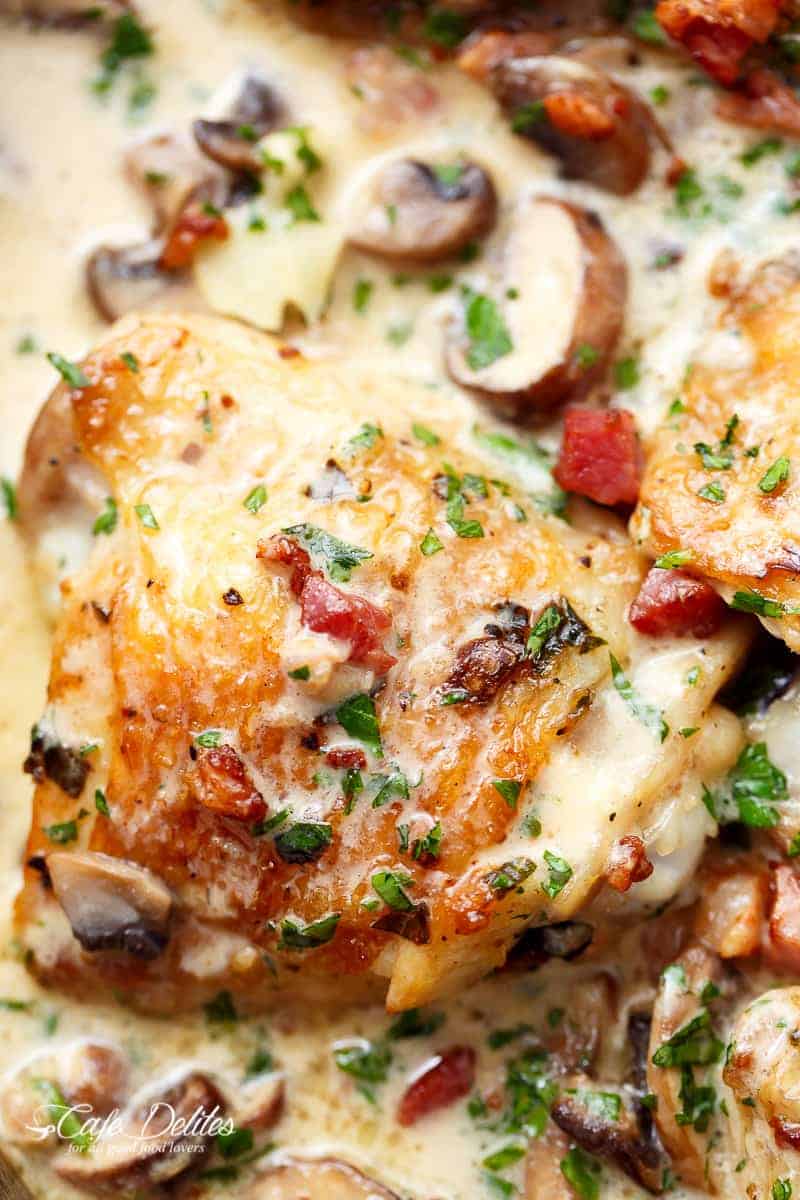 Creamy Baked Chicken Thighs with Mushrooms & Bacon in a mouthwatering cream sauce | cafedelites.com
