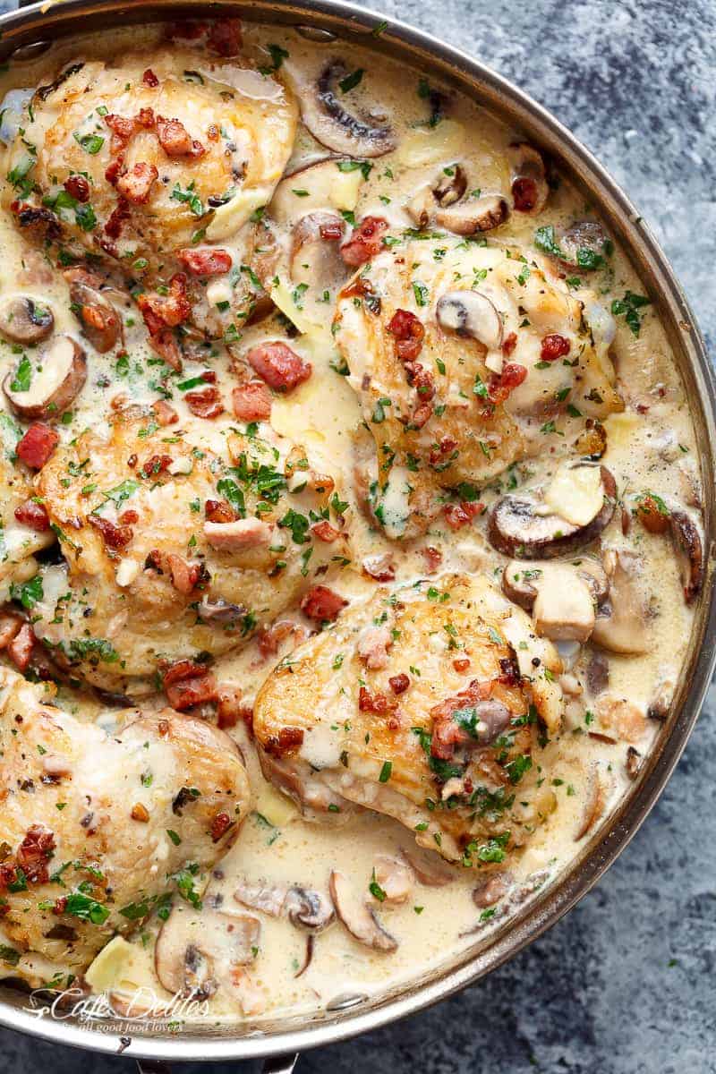 Creamy Baked Chicken Thighs with Mushrooms & Bacon in a mouthwatering cream sauce | cafedelites.com