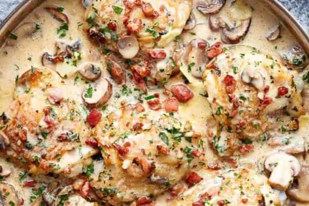 Creamy Garlic Parmesan Chicken top with extra chopped parsley.