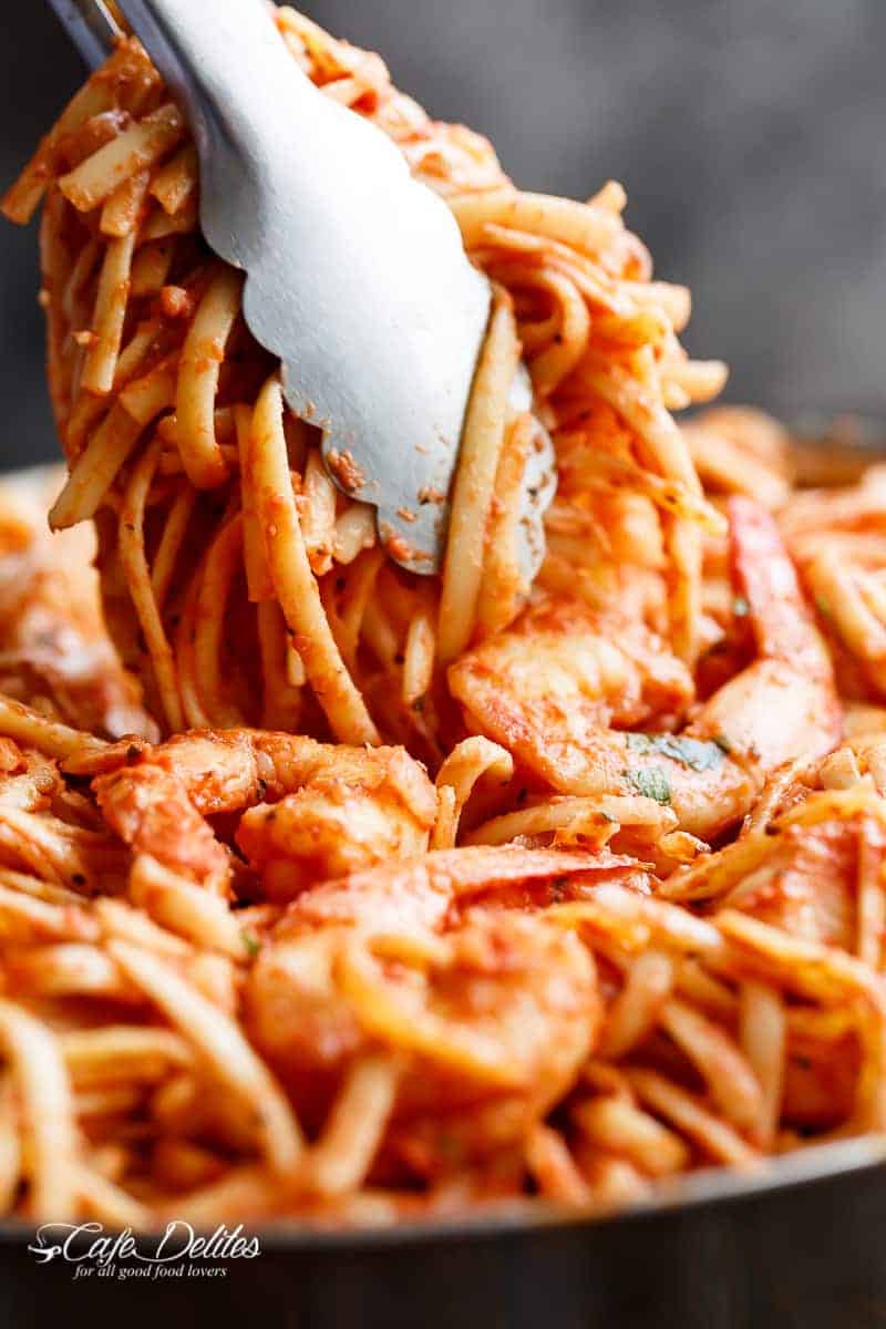 Pasta gets a delicious make over with this 15-Minute Creamy Tomato Garlic Butter Shrimp! A quick and easy flavourful dinner in minutes! | https://cafedelites.com