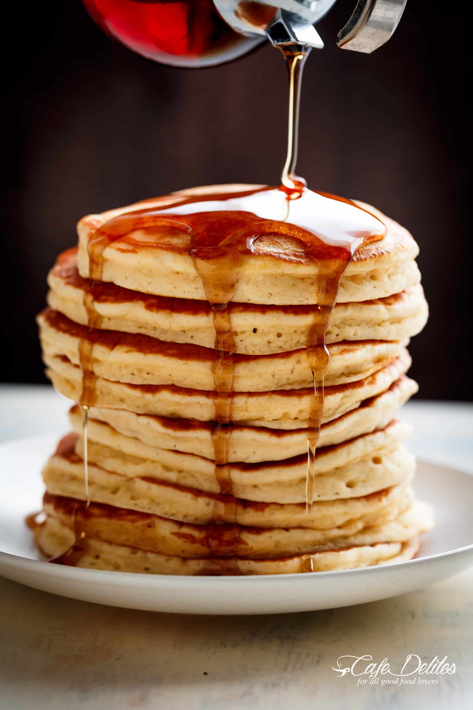 Look no further because a steaming stack of perfectly soft, Best Fluffy Pancakes are right here! Weekends will never be the same again! | https://cafedelites.com