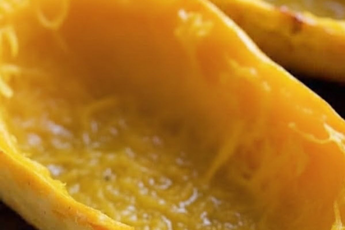 Lightly grease a baking dish, then place the roasted spaghetti squash boats inside so they are snug, upright, and ready to be filled. - 4