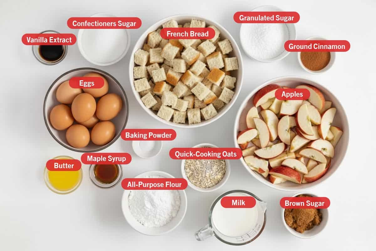 Top shot of ingredients: vanilla extract, granulated sugar, french bread, confectioners sugar, ground cinnamon, eggs, baking powder, apples, quick-cooking oats, butter, maple syrup, all-purpose flour, milk, and brown sugar.