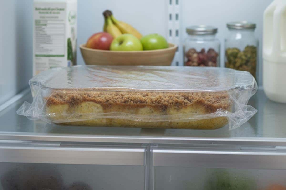 Placed the dish with plastic wrap in the fridge.