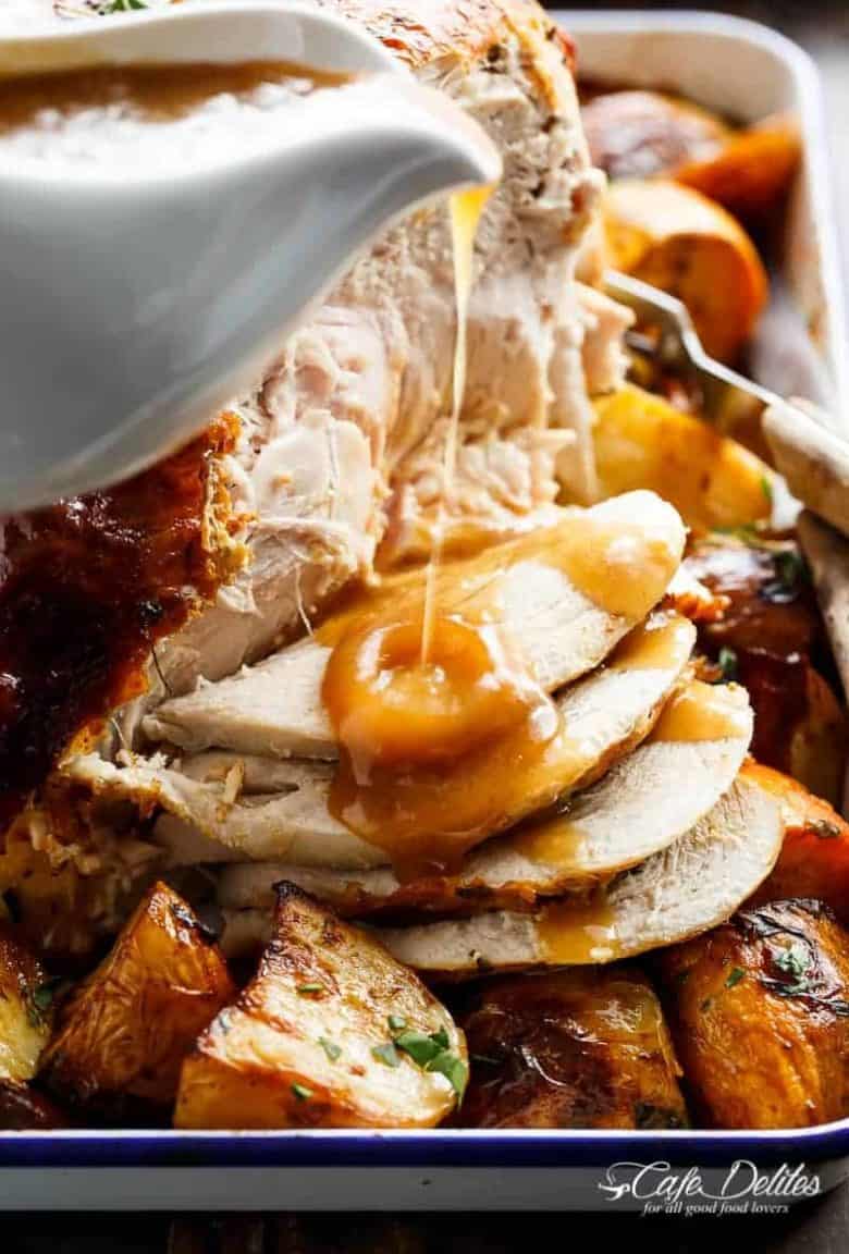 One Pan Juicy Herb Roasted Turkey & Potatoes, with a flavourful gravy made with only 3 ingredients, just in time for Thanksgiving menu planning! | https://cafedelites.com