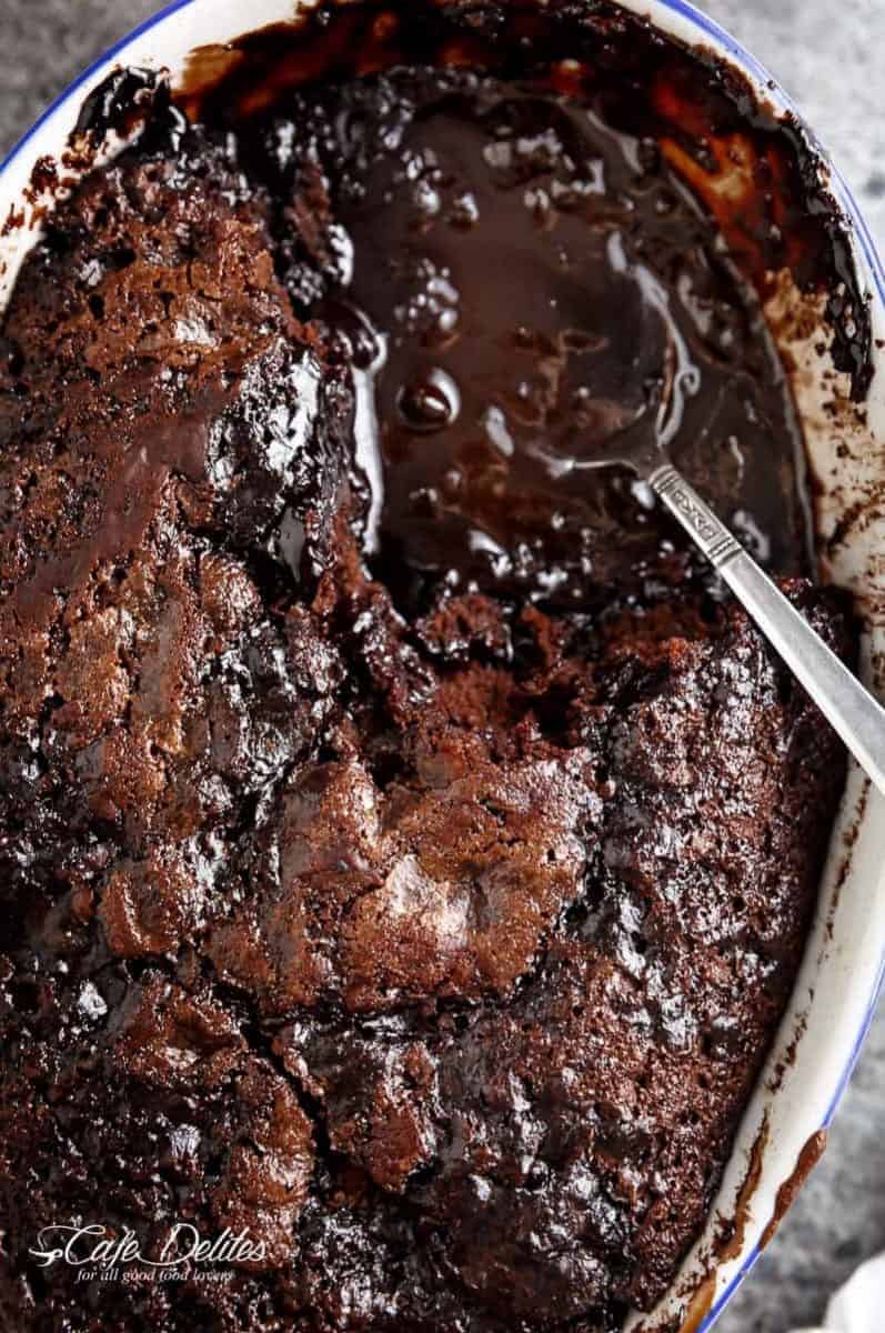Hot Fudge Chocolate Pudding Cake is extremely easy to make! A rich chocolate fudge sauce forms underneath a layer of chocolate cake while baking, by itself! | https://cafedelites.com