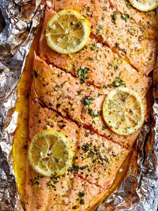 Lemon Butter Garlic Salmon with lemon slices on a foil