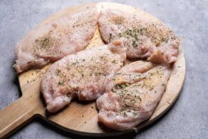 chicken breasts with the onion and garlic powders and herbs.