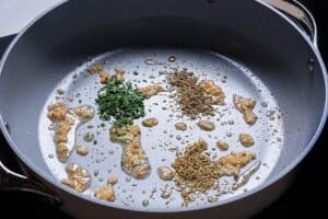 garlic, parsley, thyme, and rosemary in olive oil