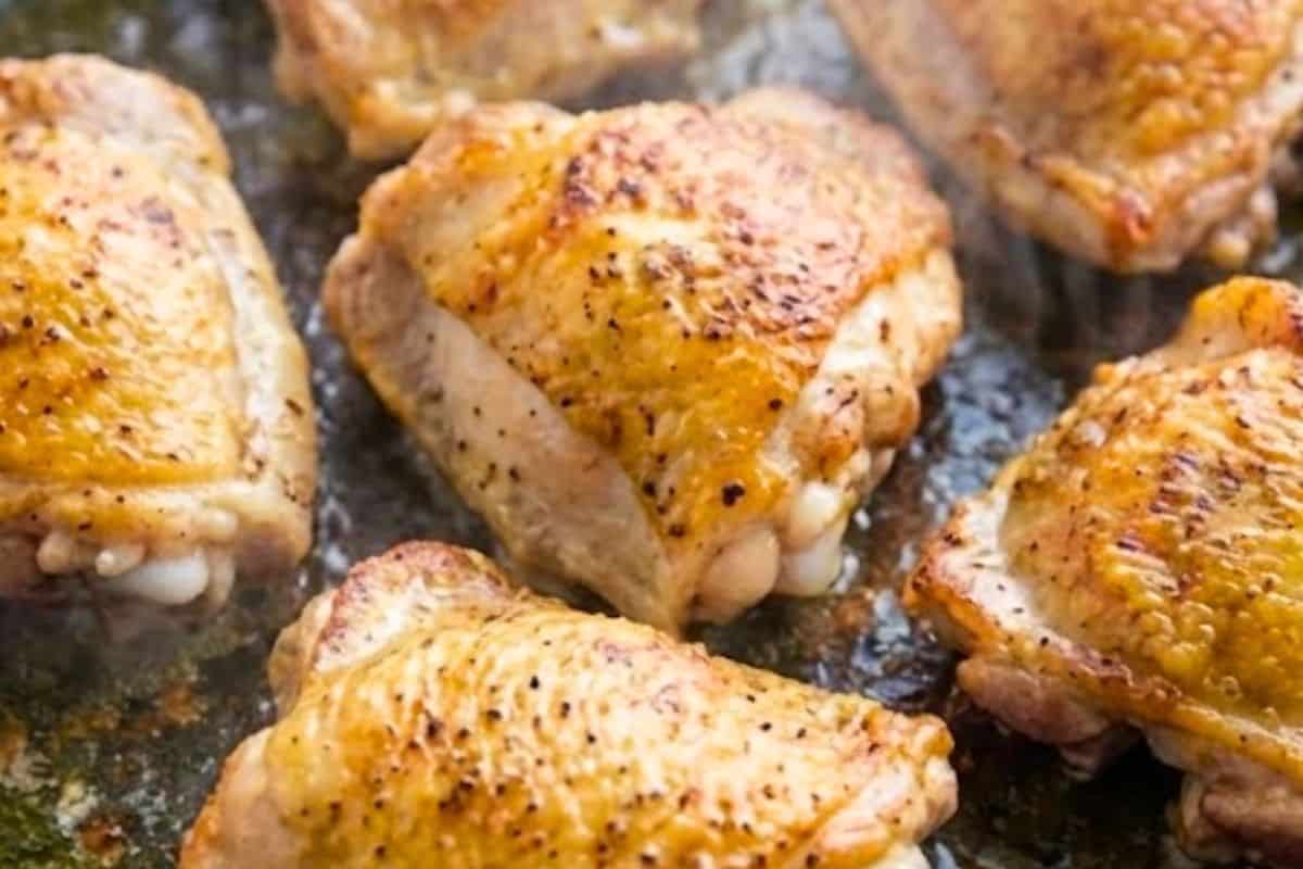 Season chicken with salt and pepper, then heat a oil and sear skin-side down for 3 minutes until golden