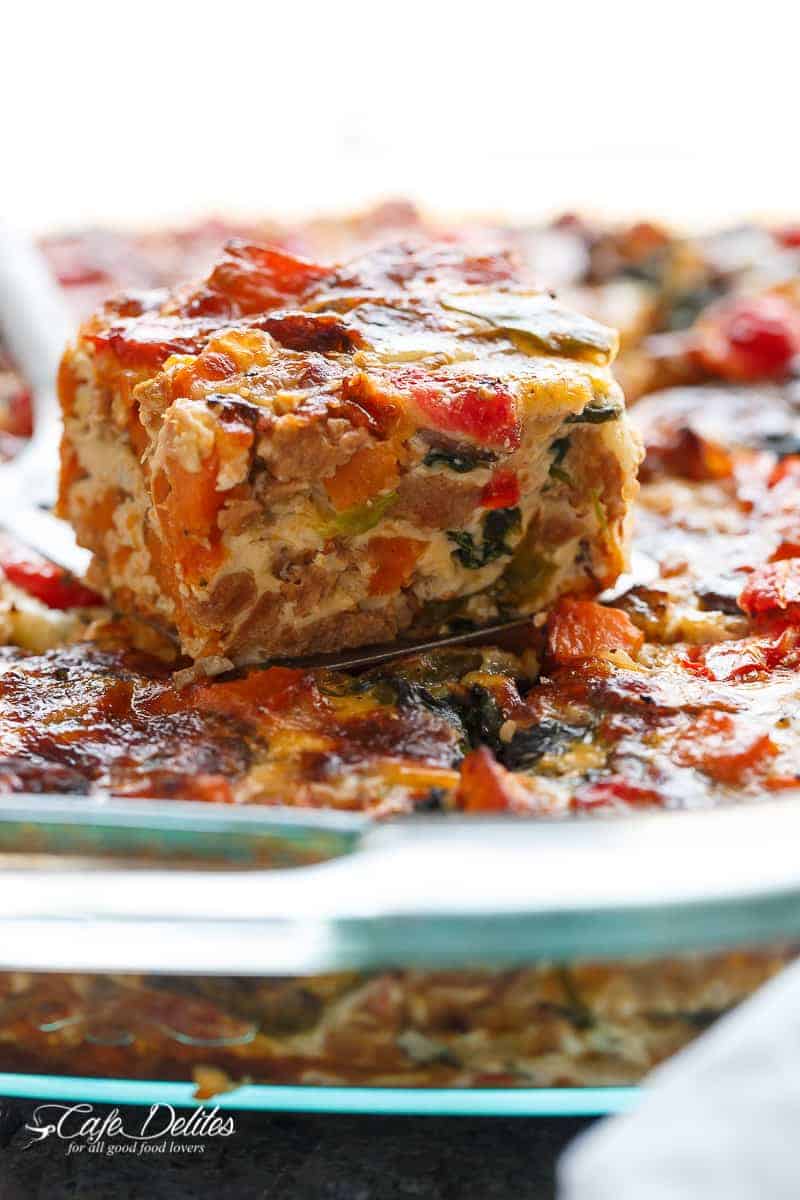 An easy and heathy LOADED Sweet Potato Hash Brown Breakfast Casserole, complete with as many vegetables as YOU want, crumbled sausages, eggs and crisp-tender sweet potato hash browns! | https://cafedelites.com