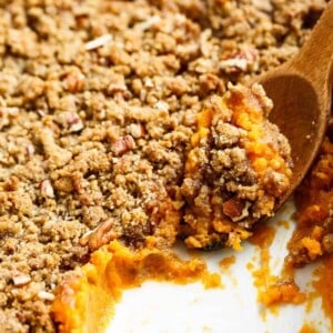 Sweet Potato Casserole with wooden spoon