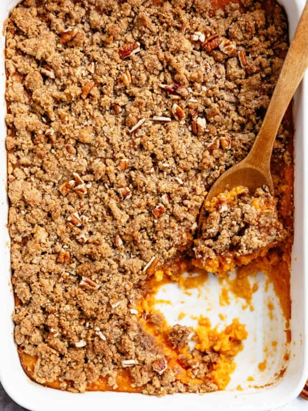 Sweet Potato Casserole with wooden spoon