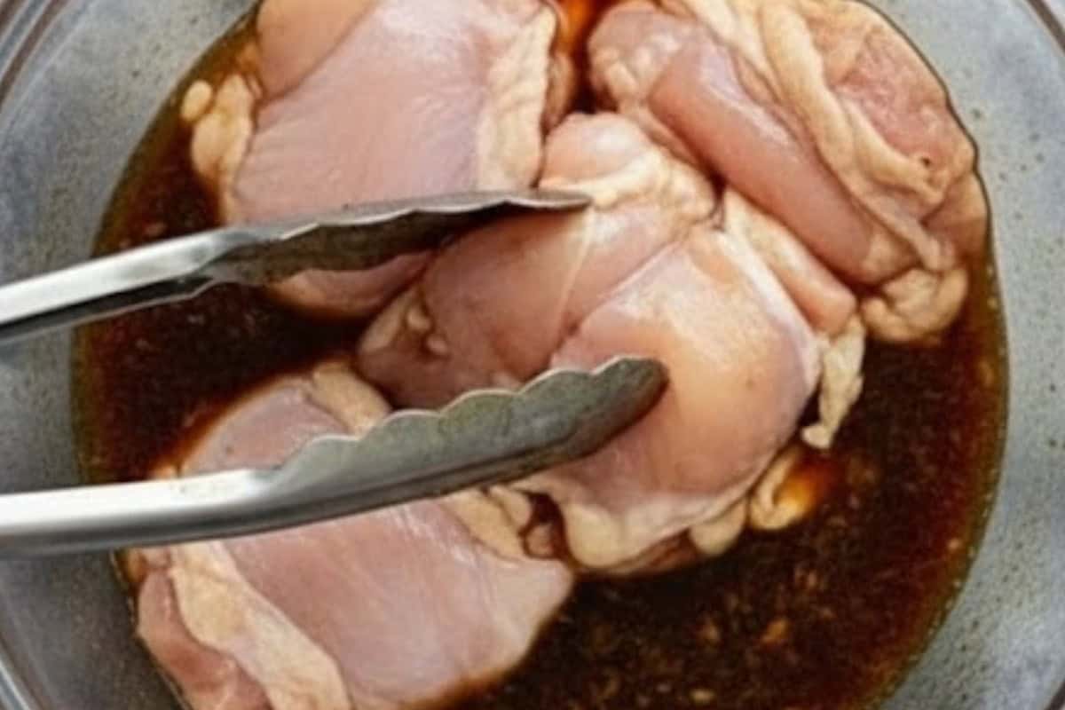 Add the chicken thighs to the remaining marinade and coat them evenly on all sides.