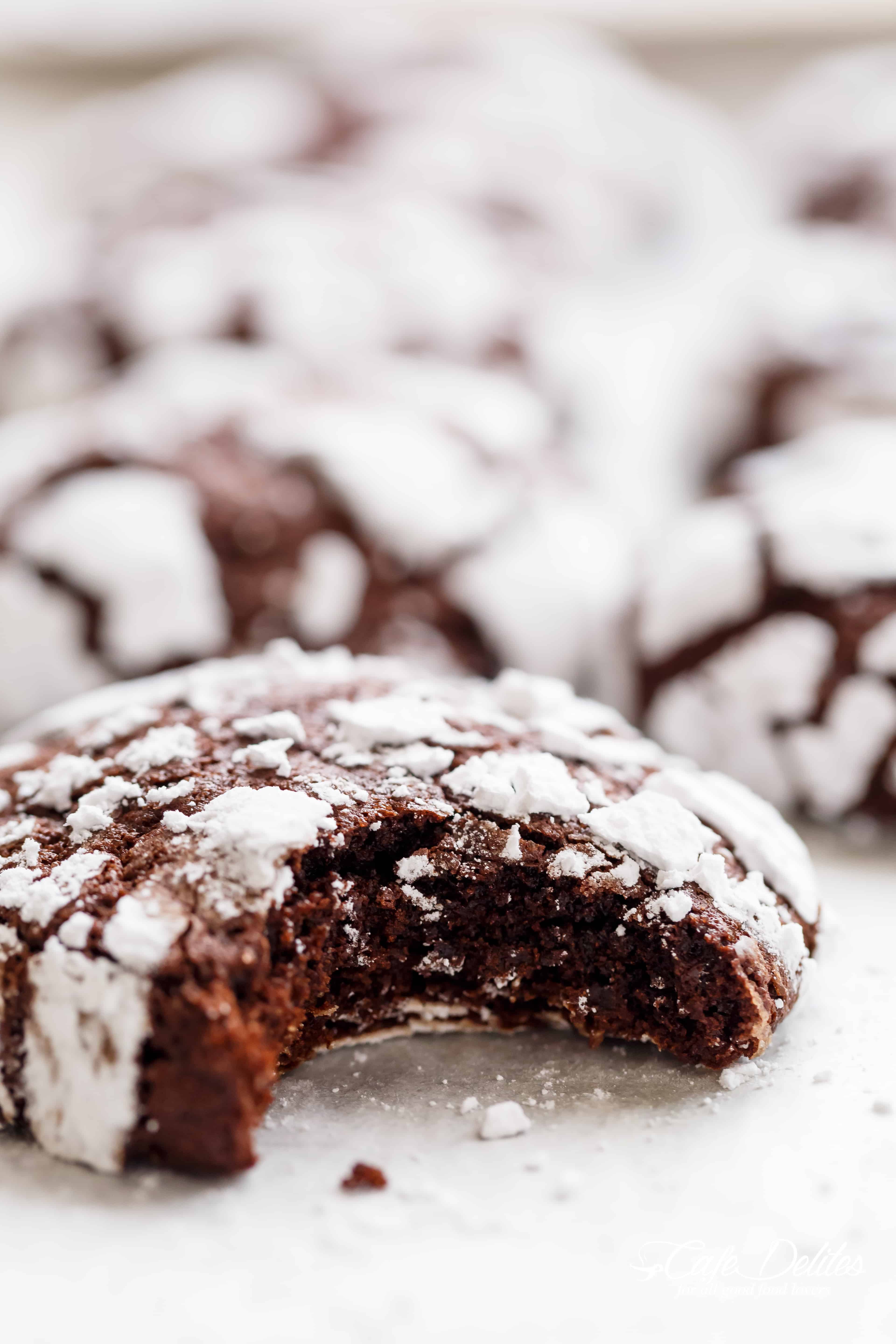 Fudgy Chocolate Crinkle Cookies have an irresistible brownie textured centre, with a crunch of cookie on the outside! One of our favourite Christmas cookies right here! ONLY 88 calories EACH! | https://cafedelites.com