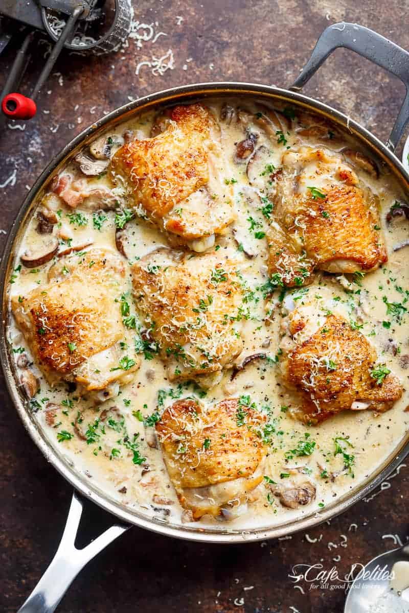 Top view image of Creamy Parmesan Herb Mushroom Chicken in a pan