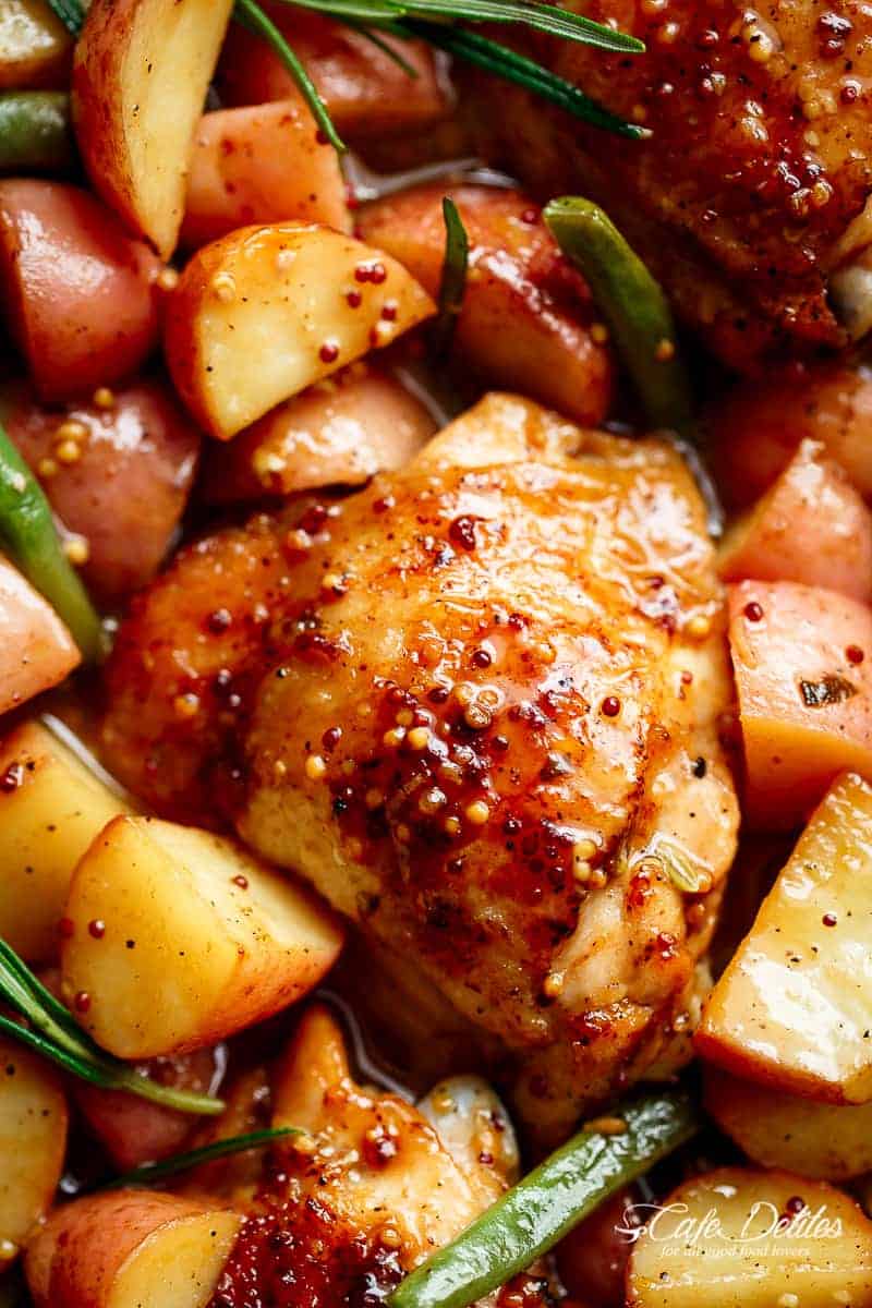 Honey Mustard Chicken & Potatoes is all made in one pan! Juicy, succulent chicken pieces are cooked in the best honey mustard sauce, surrounded by green beans and potatoes for a complete meal! | https://cafedelites.com