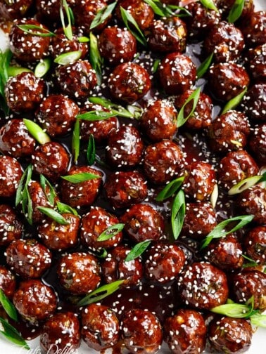 Tender Mongolian Glazed Meatballs are not only FILLED with Asian flavour -- they are smothered in the BEST homemade Mongolian sauce to wow your guests!