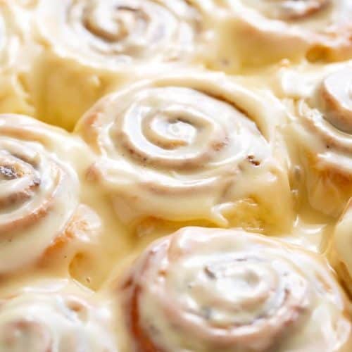 Quick Soft Cinnamon Rolls with a cream cheese glaze are super fluffy and light with a simple homemade dough, and a quick method to get baking!