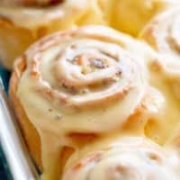 Quick Soft Cinnamon Rolls with a cream cheese glaze are super fluffy and light with a simple homemade dough, and a quick method to get baking! | https://cafedelites.com