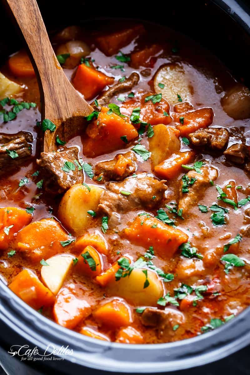 Slow Cooker Beef & Sweet Potato Stew is easy to throw together and filled with fall apart, tender beef pieces and sweet potato! | https://cafedelites.com