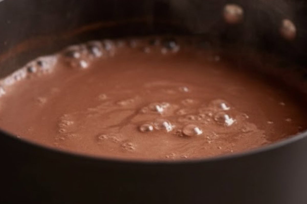 Bring the milk to a gentle simmer, then reduce the heat.