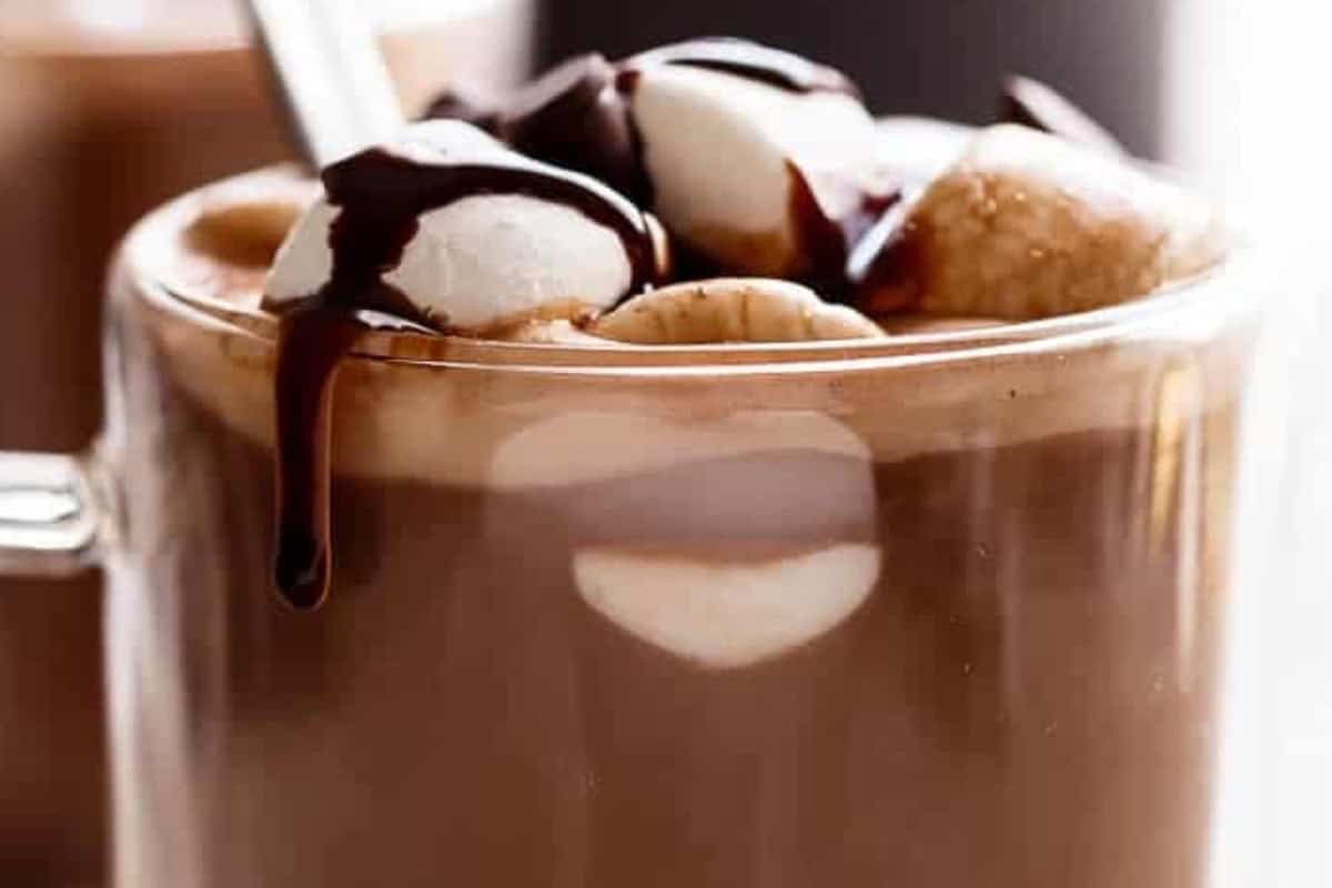 Pour the hot chocolate into mugs and top with whipped cream, marshmallows or dust cocoa powder on top.