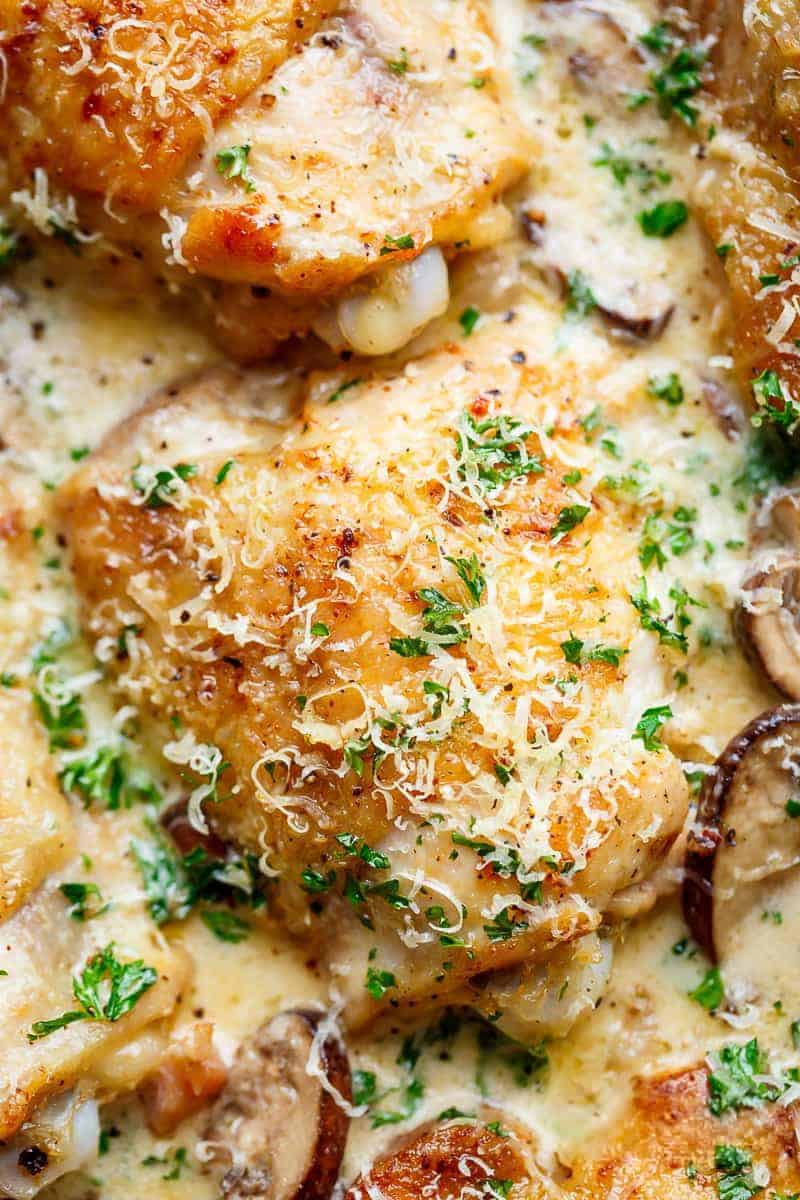 Close-Up of Creamy Parmesan Herb Mushroom Chicken in a pan