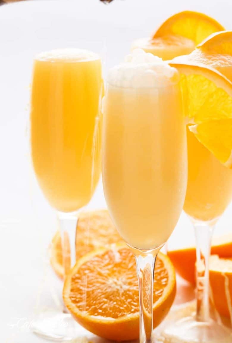 Orange Creamsicle Mimosas is the perfect refreshing beverage to add to your breakfast or brunch menu! A champagne cocktail that tastes just like a Creamsicle! | https://cafedelites.com