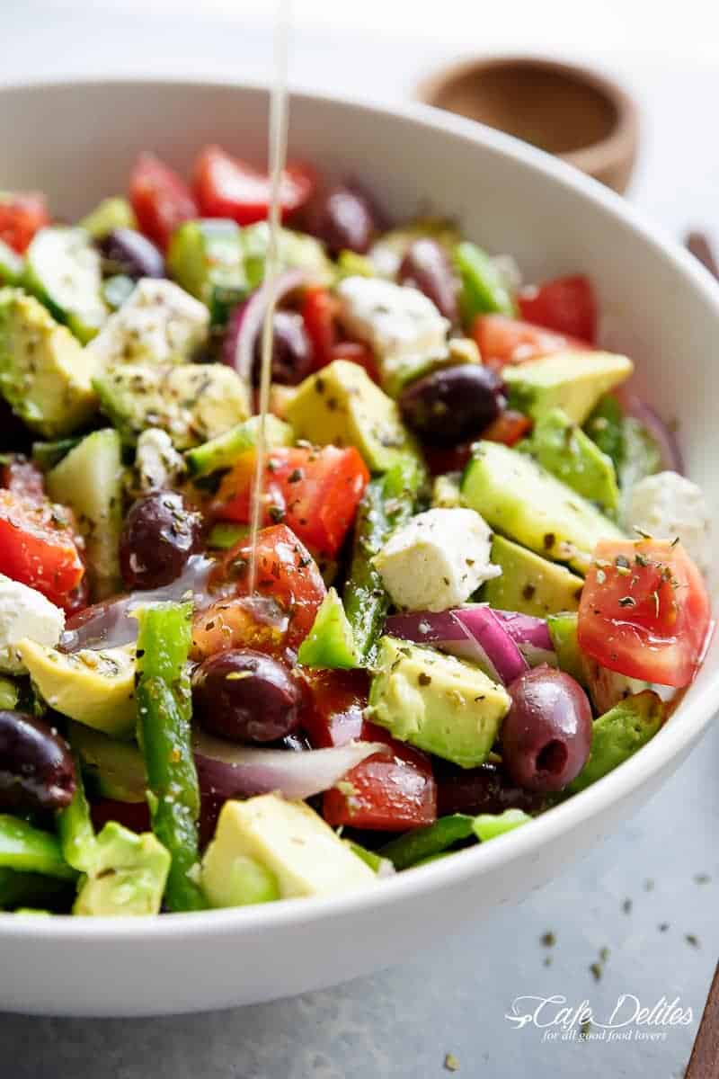 Avocado Greek Salad with a Greek Salad Dressing is a family favourite side salad served with anything! | https://cafedelites.com