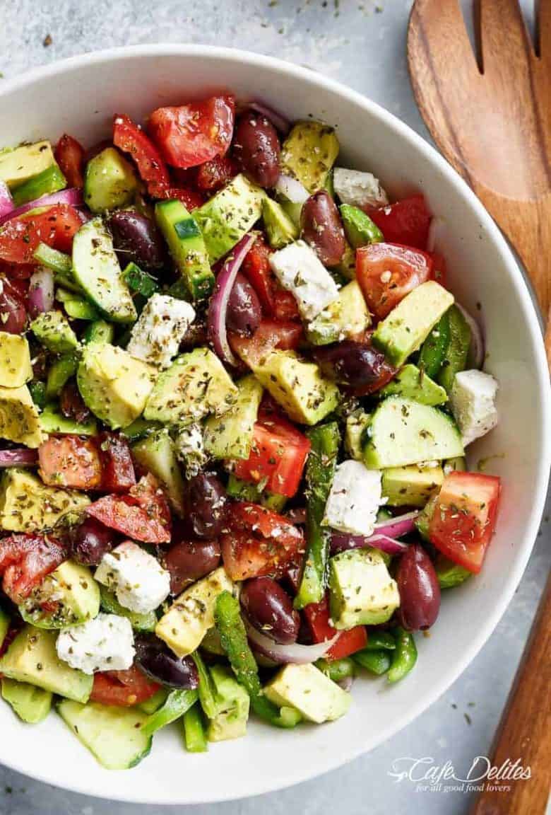 Avocado Greek Salad with a Greek Salad Dressing is a family favourite side salad served with anything! | https://cafedelites.com
