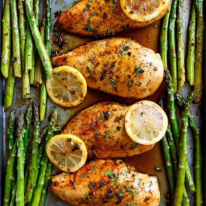 4 pieces of One Pan Honey Lemon Chicken Asparagus