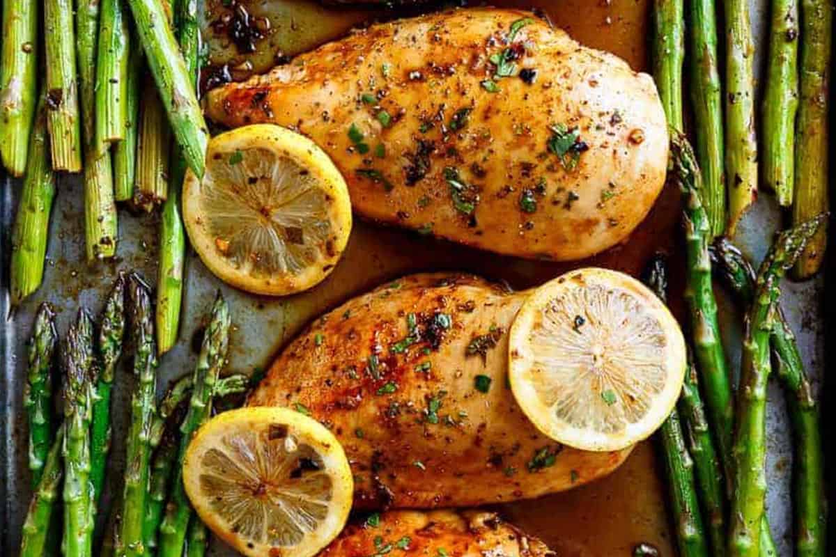 Close-up shot of One Pan Honey Lemon Chicken and Asparagus.