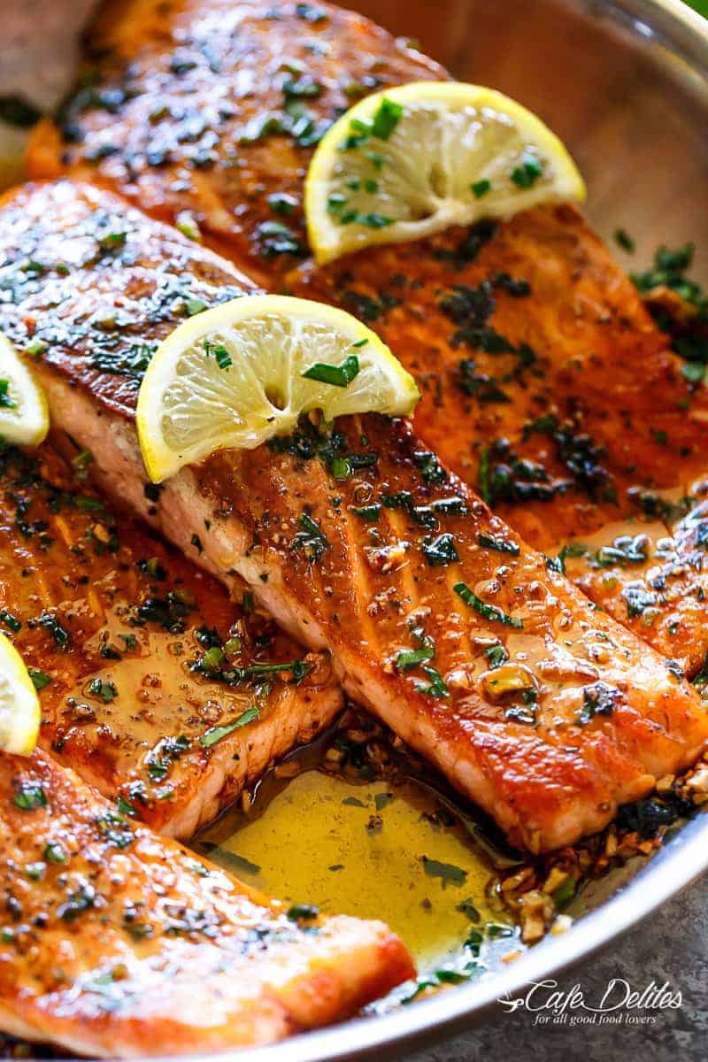 Crispy Seared Lemon Garlic Herb Salmon is a deliciously easy salmon recipe, so simple to make, yet so delicious! Crispy on the outside, soft and tender on the inside! | https://cafedelites.com