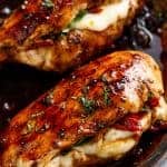 Caprese Stuffed Balsamic Chicken is a twist on Caprese, filled with both fresh AND Sun Dried Tomatoes for a flavour packed chicken! | https://cafedelites.com
