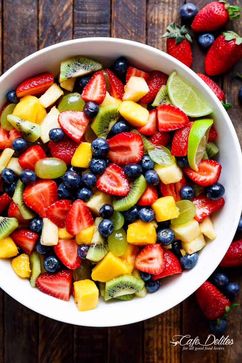 Honey Lime Fruit Salad is an incredible tasting and refreshing fruit salad! If you love honey and lime, you will LOVE a bowl of this fruit salad! | https://cafedelites.com