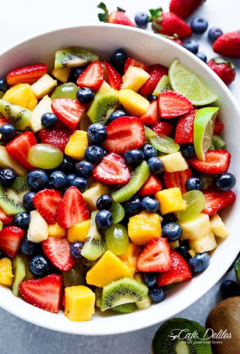 Honey Lime Fruit Salad is an incredible tasting and refreshing fruit salad! If you love honey and lime, you will LOVE a bowl of this fruit salad! | https://cafedelites.com