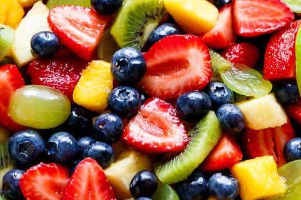 Whisk together the honey, fresh lime juice, and pineapple juice; pour over the fruit and gently fold to coat.