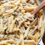 Seared chicken strips are mixed through this One-Pot Creamy Mushroom Chicken Pasta, with garlic, mushrooms AND parmesan cheese | https://cafedelites.com