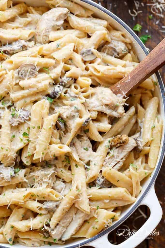 Seared chicken strips are mixed through this One-Pot Creamy Mushroom Chicken Pasta, with garlic, mushrooms AND parmesan cheese | https://cafedelites.com